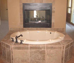 Jetted tub with fireplace