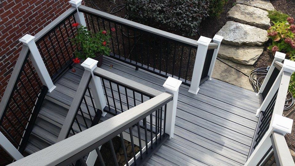 Example of a mid-sized backyard balcony deck design in Indianapolis