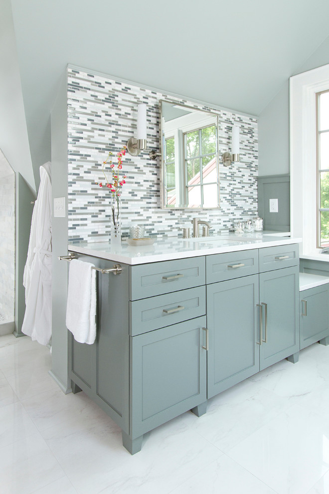 Large transitional master bathroom in Minneapolis with flat-panel cabinets, grey cabinets, an undermount tub, an alcove shower, a one-piece toilet, blue tile, glass tile, blue walls, marble floors, an undermount sink, quartzite benchtops, white floor and an open shower.