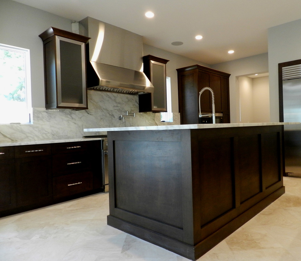 Example of a tuscan kitchen design in Tampa