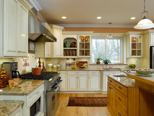 Off-White Kitchen Cabinets with Contrasting Island