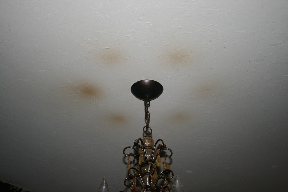 Yikes! Burn marks on ceiling above chandy bulbs