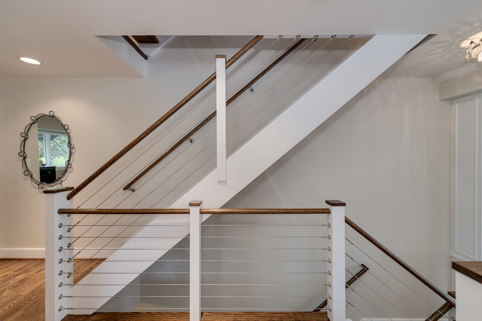 Inspiration for a mid-sized modern wood straight staircase in DC Metro with open risers.