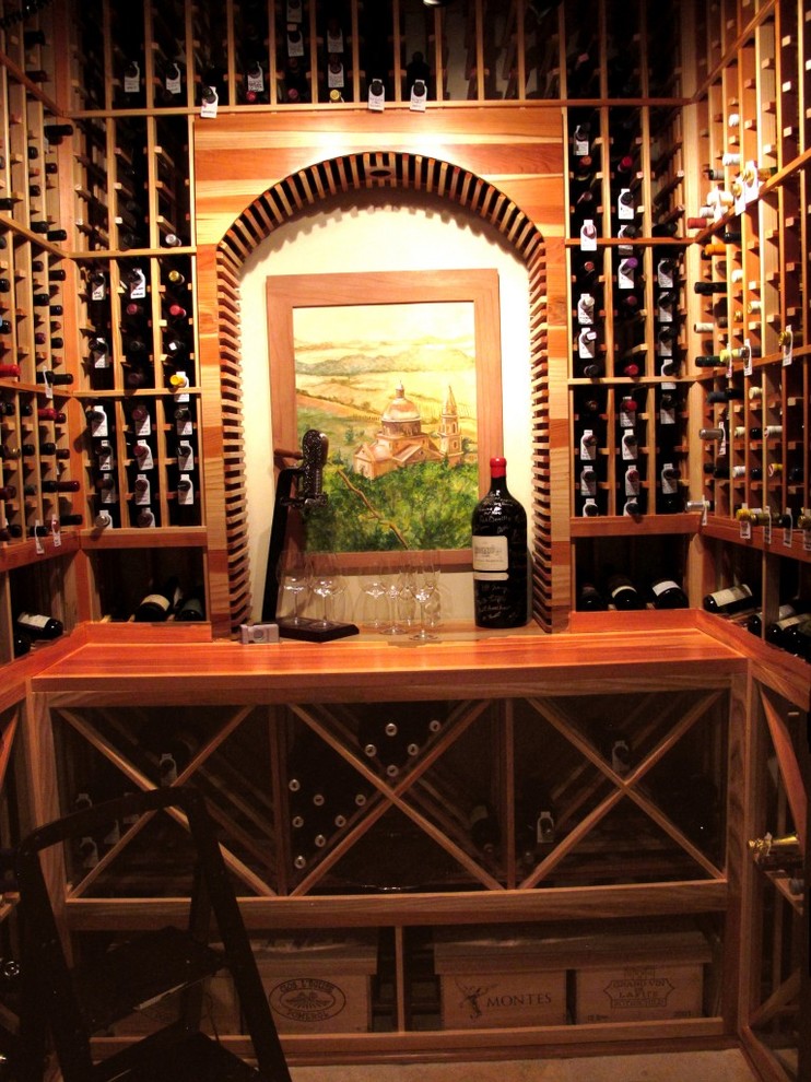 Photo of a mid-sized traditional wine cellar in Atlanta with storage racks.