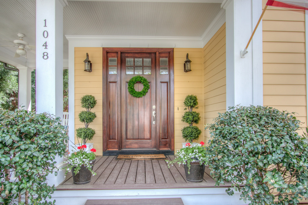 Mid-sized transitional two-story entryway photo in Charlotte