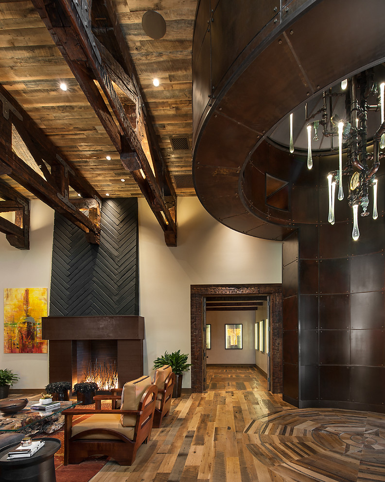 Example of a mountain style home design design in Phoenix