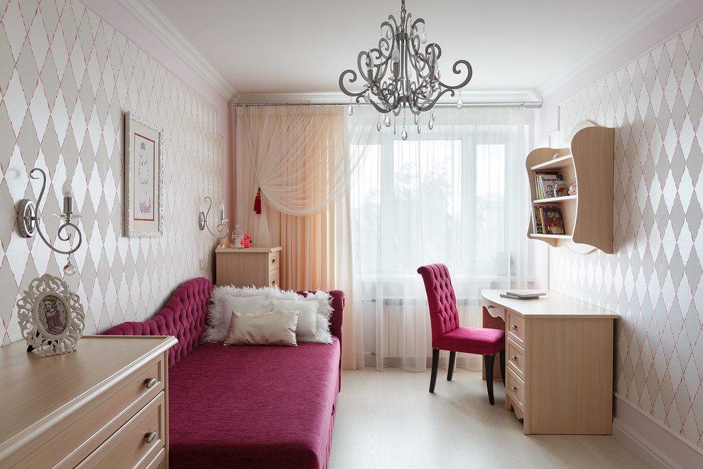 Inspiration for a transitional kids' room for girls in Saint Petersburg with light hardwood floors.