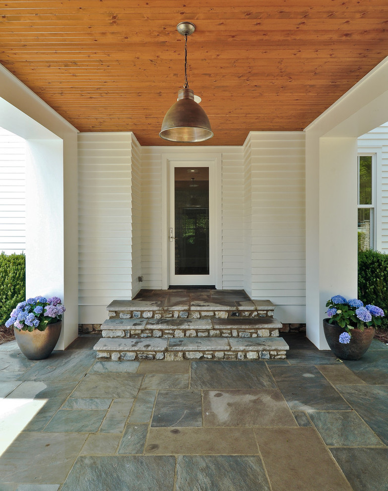 This is an example of a country front door in Nashville with a single front door and a glass front door.