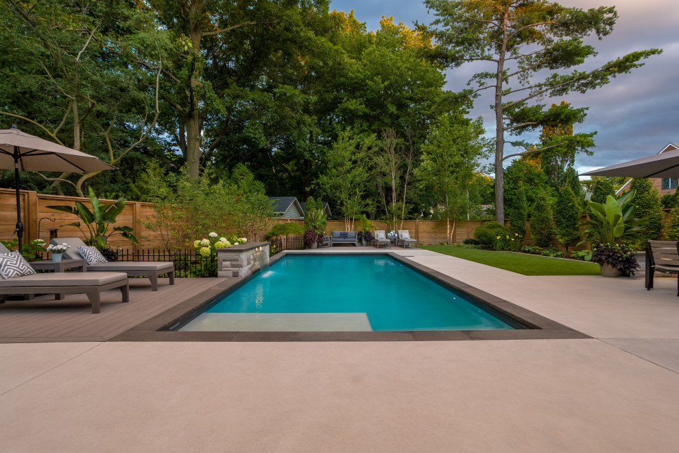 Inspiration for a mid-sized transitional pool remodel in Toronto