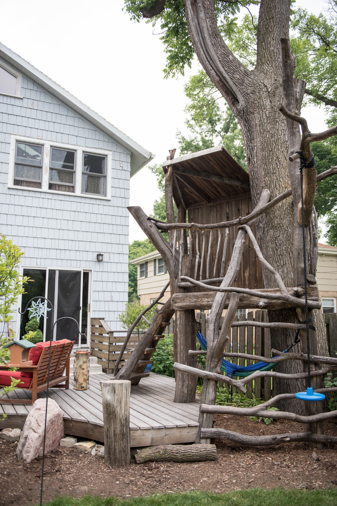 Inspiration for a mid-sized eclectic backyard deck in Milwaukee with no cover.