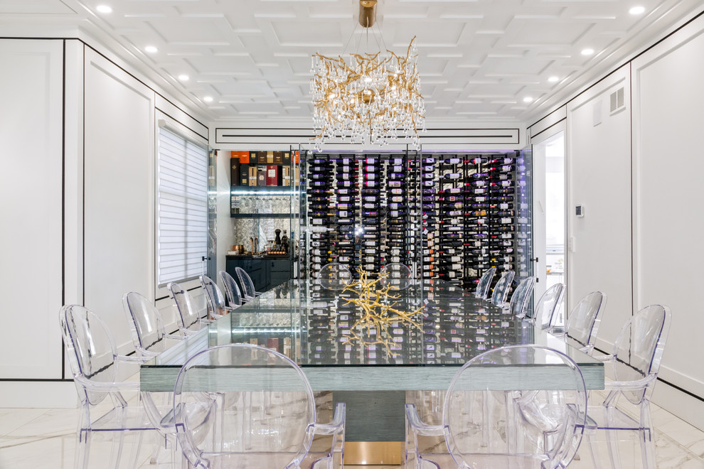 Design ideas for a mid-sized modern wine cellar in New York with marble floors, display racks and white floor.