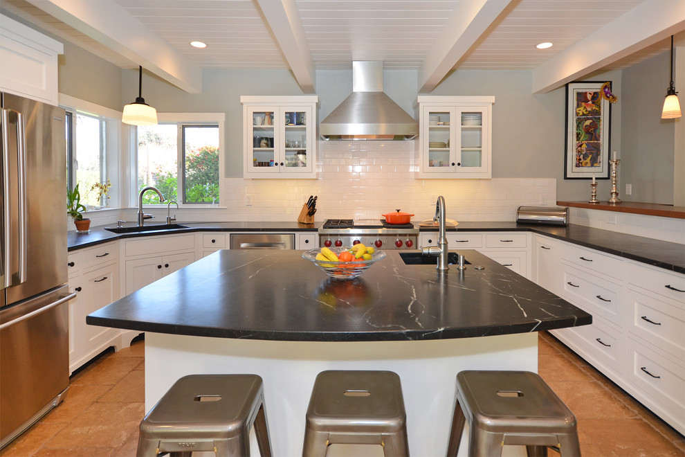 This is an example of a mid-sized midcentury u-shaped separate kitchen in San Francisco with a single-bowl sink, shaker cabinets, white cabinets, marble benchtops, white splashback, ceramic splashback, stainless steel appliances, terra-cotta floors and with island.
