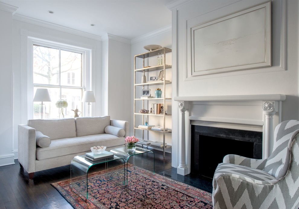 This is an example of a transitional living room in DC Metro with white walls.