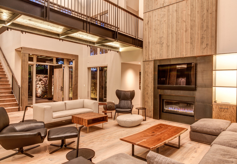 Grand Lake Home - Example of a mountain style living room design in Denver