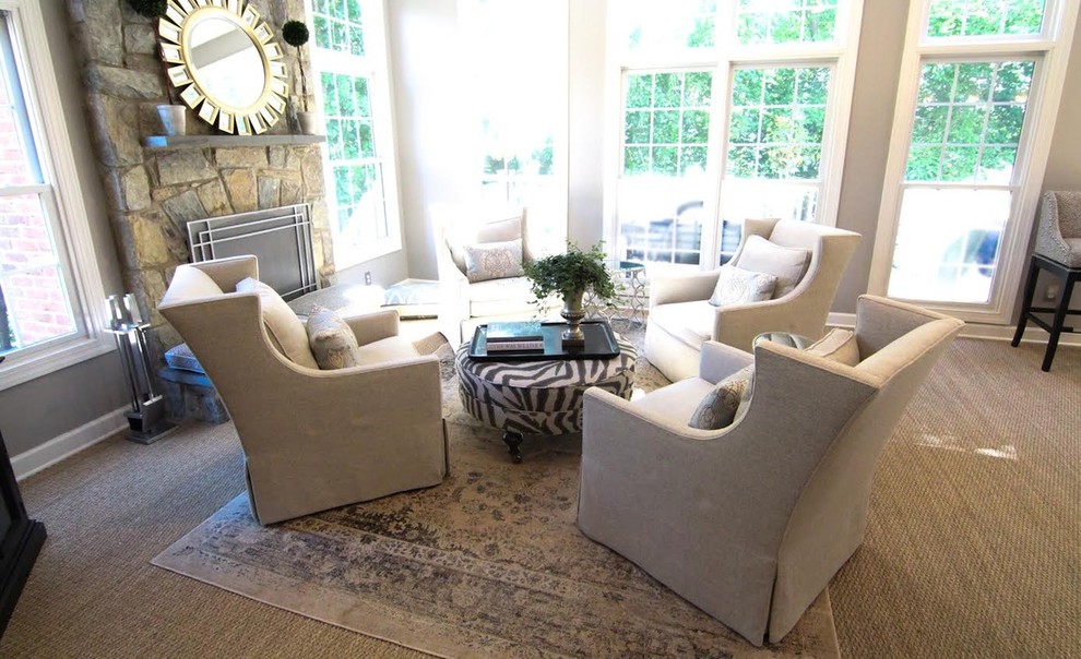 Inspiration for a mid-sized transitional open concept family room in DC Metro with grey walls, carpet, a standard fireplace, a stone fireplace surround and no tv.