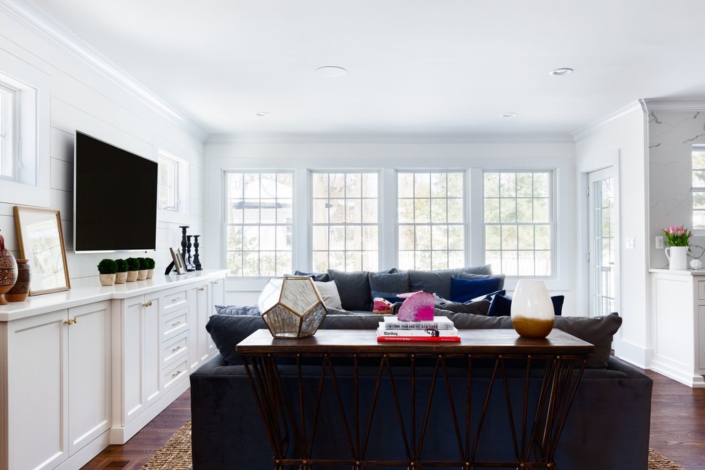 Example of a transitional living room design in New York