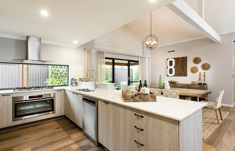 Inspiration for a beach style eat-in kitchen in Perth with a double-bowl sink, stainless steel appliances, medium hardwood floors and with island.