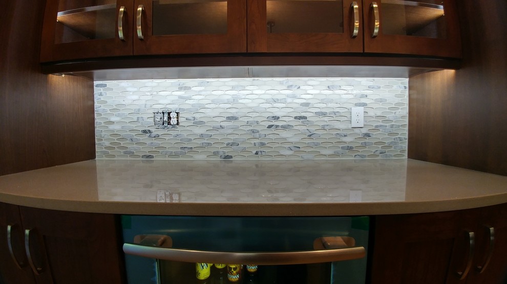 Inspiration for a kitchen remodel in Seattle with quartz countertops and mosaic tile backsplash