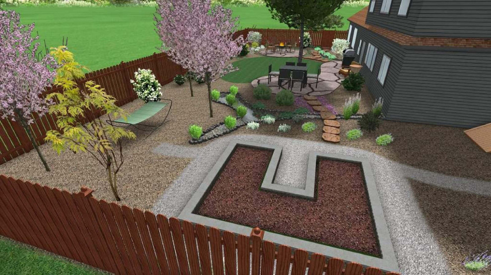 Design ideas for a mid-sized country backyard full sun formal garden in Denver with with raised garden bed and natural stone pavers.