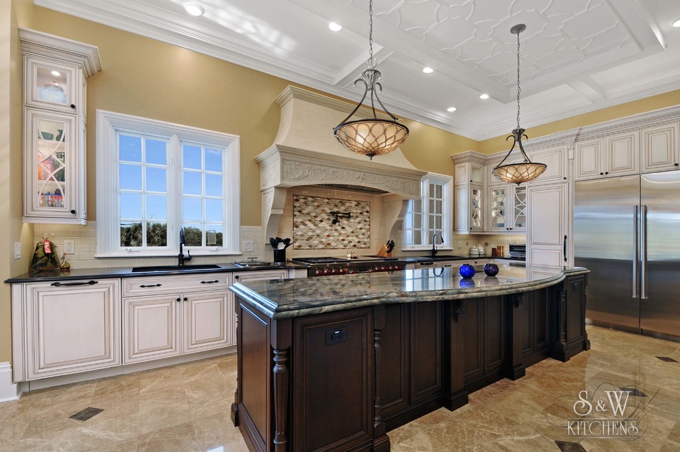 This is an example of an expansive traditional kitchen pantry in Tampa with an undermount sink, open cabinets, white cabinets, quartz benchtops, black splashback, glass sheet splashback, stainless steel appliances, marble floors and with island.
