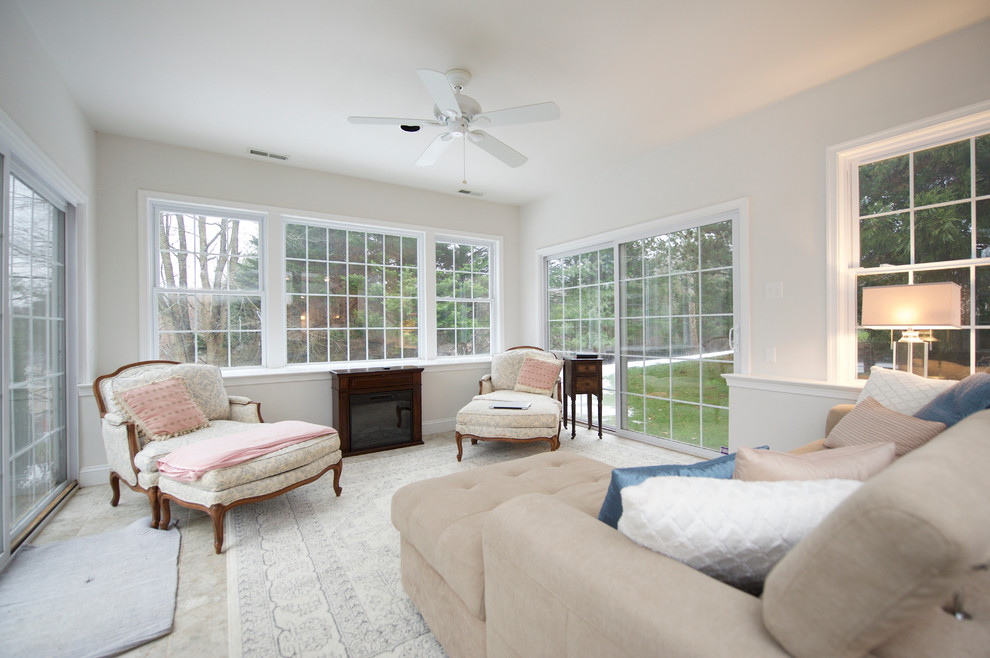 Photo of a mid-sized traditional walk-out basement in Philadelphia with white walls, ceramic floors and no fireplace.