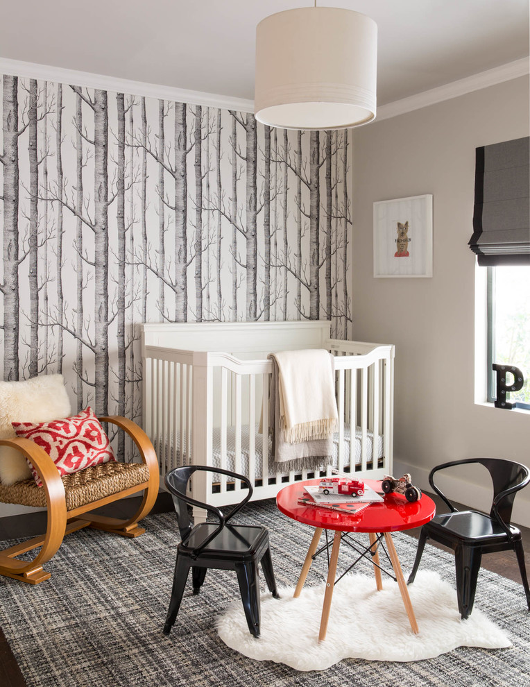 Inspiration for a large contemporary nursery for boys in San Francisco with grey walls and dark hardwood floors.
