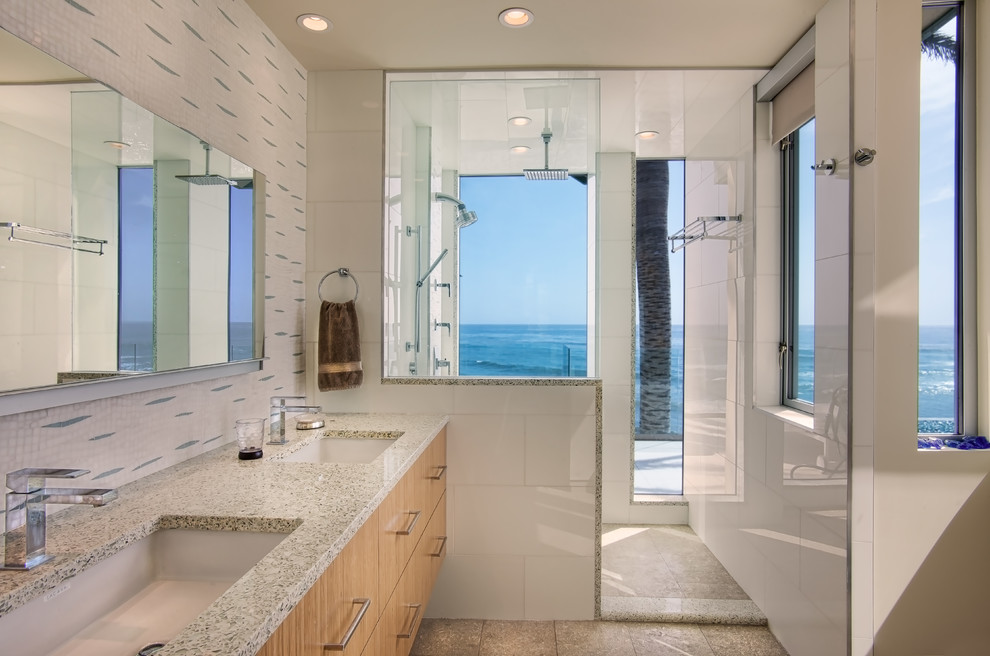 Large contemporary master bathroom in San Diego with an undermount sink, flat-panel cabinets, medium wood cabinets, an alcove shower, white tile, porcelain tile, beige walls, granite benchtops, an open shower, a one-piece toilet and beige floor.