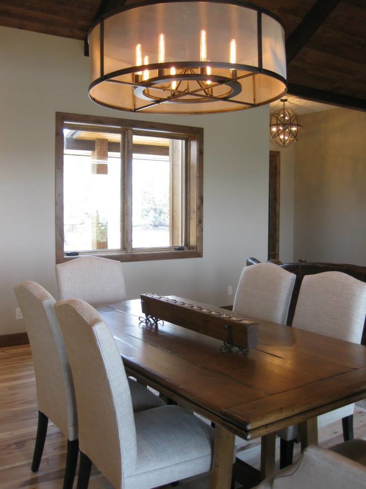 Inspiration for a mid-sized rustic light wood floor great room remodel with beige walls