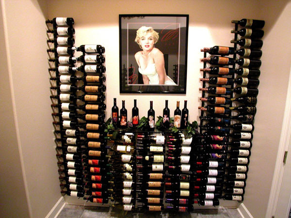 Inspiration for a small traditional wine cellar in Los Angeles with slate floors and display racks.