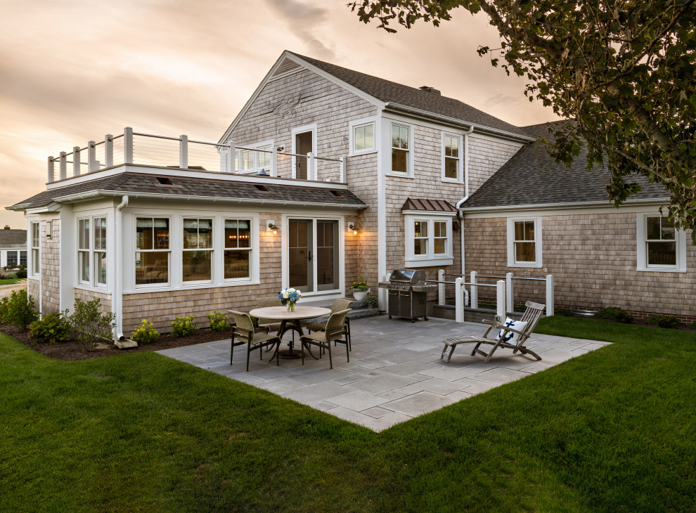 Example of a beach style patio design in Boston