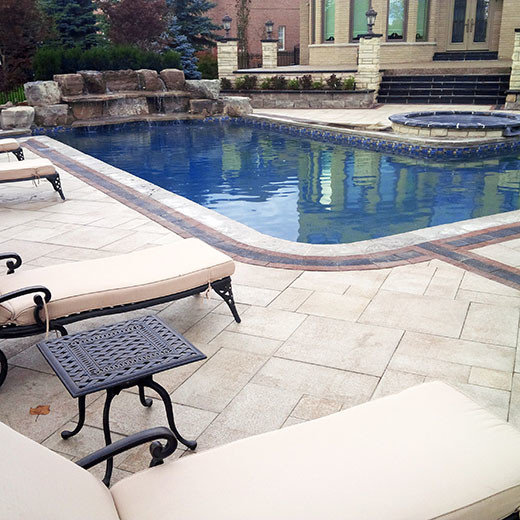 Inspiration for a large transitional backyard stone and l-shaped hot tub remodel in Toronto