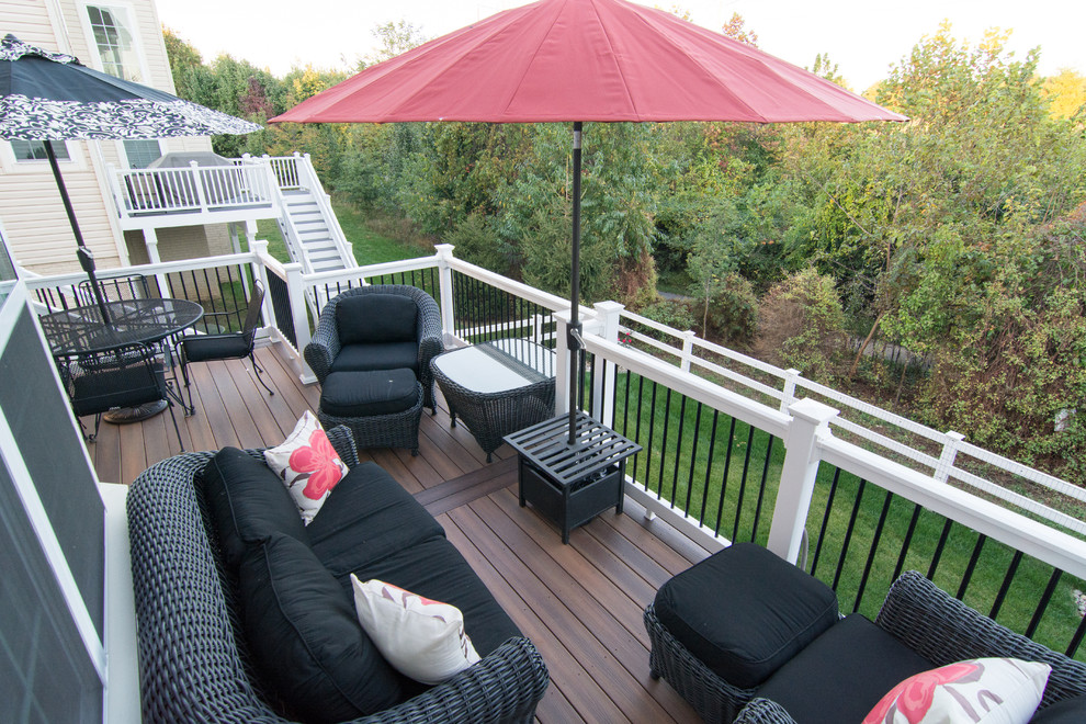 Inspiration for a large transitional backyard deck in DC Metro with no cover.