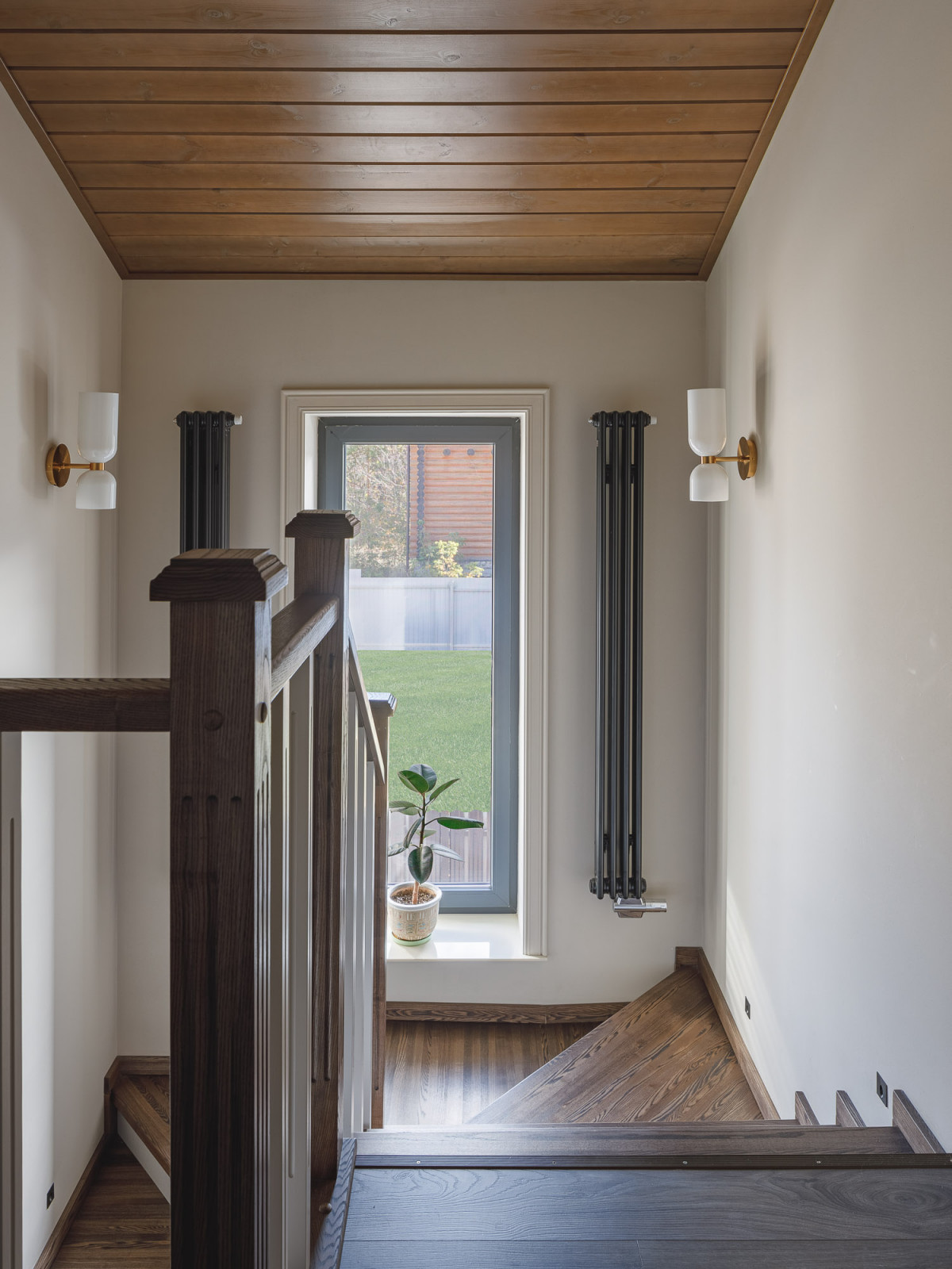 Кухня-гостиная с камином в коттедже Малая Царевщина