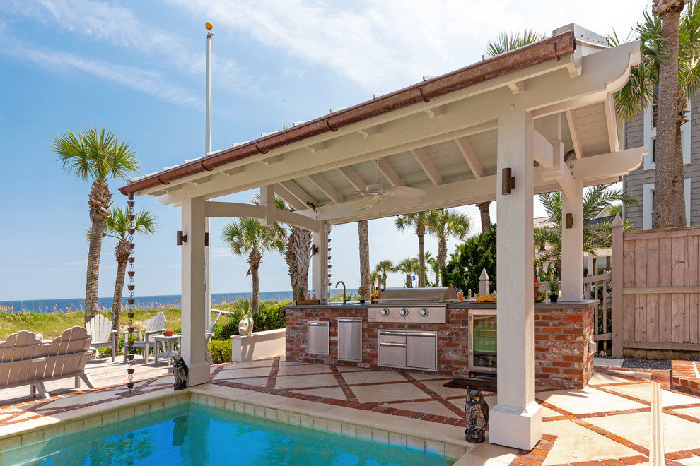 This is an example of a mid-sized beach style exterior in Jacksonville with a metal roof.
