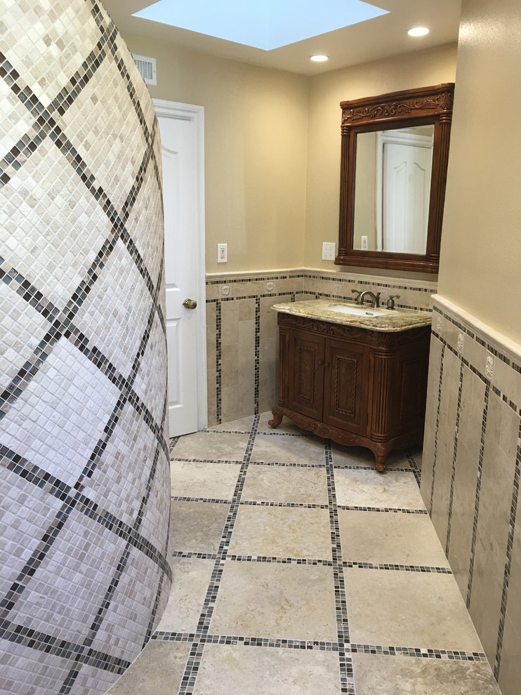 Example of a transitional home design design in Orange County