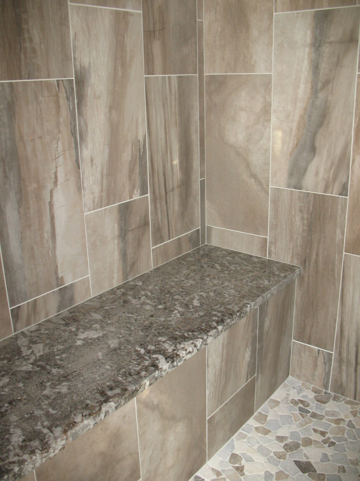 Design ideas for a large contemporary bathroom in Bridgeport with brown tile and porcelain tile.