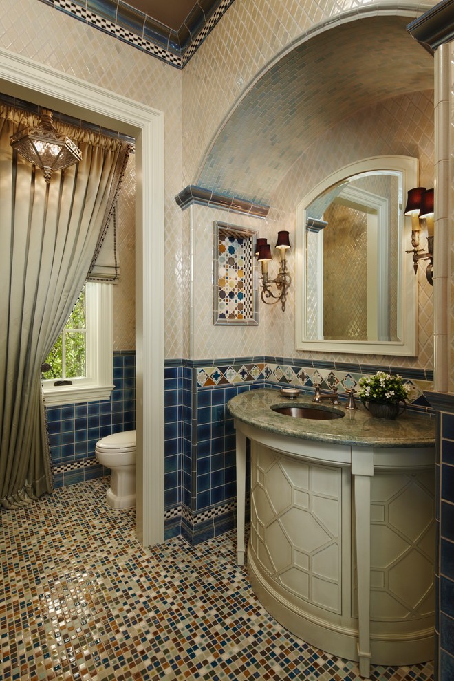 Design ideas for a mid-sized transitional powder room in Detroit with a two-piece toilet, beige tile, blue tile, multi-coloured tile, ceramic tile, white walls, mosaic tile floors and an undermount sink.