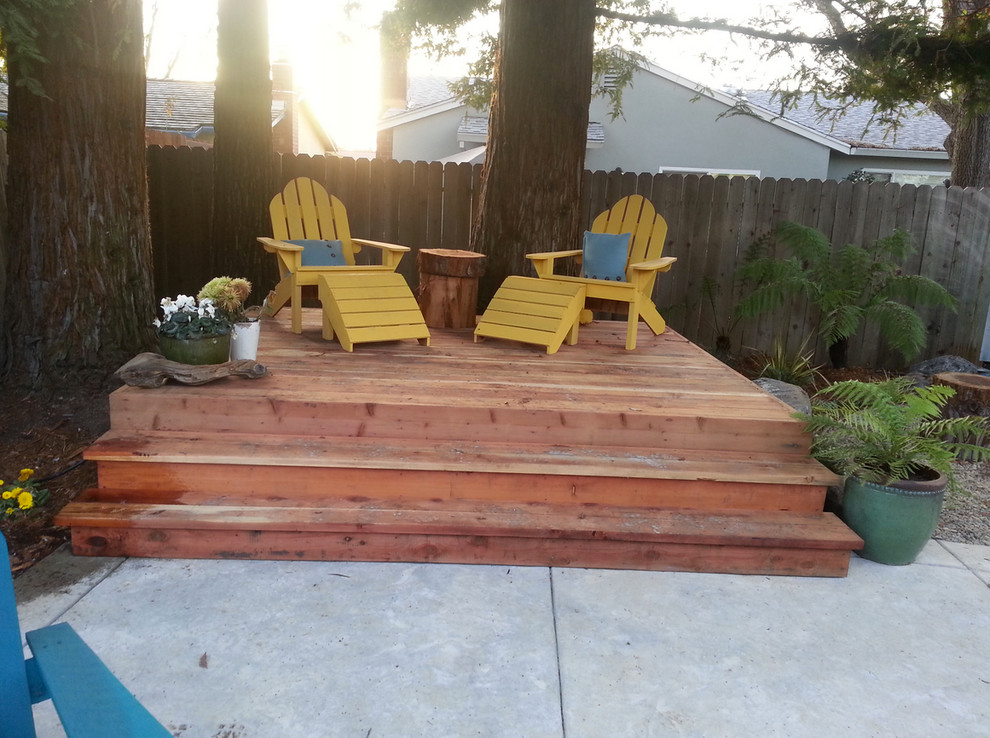 Deck - mid-sized transitional backyard deck idea in Sacramento with no cover