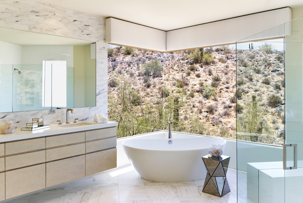 Design ideas for a contemporary bathroom in Phoenix with a freestanding tub.