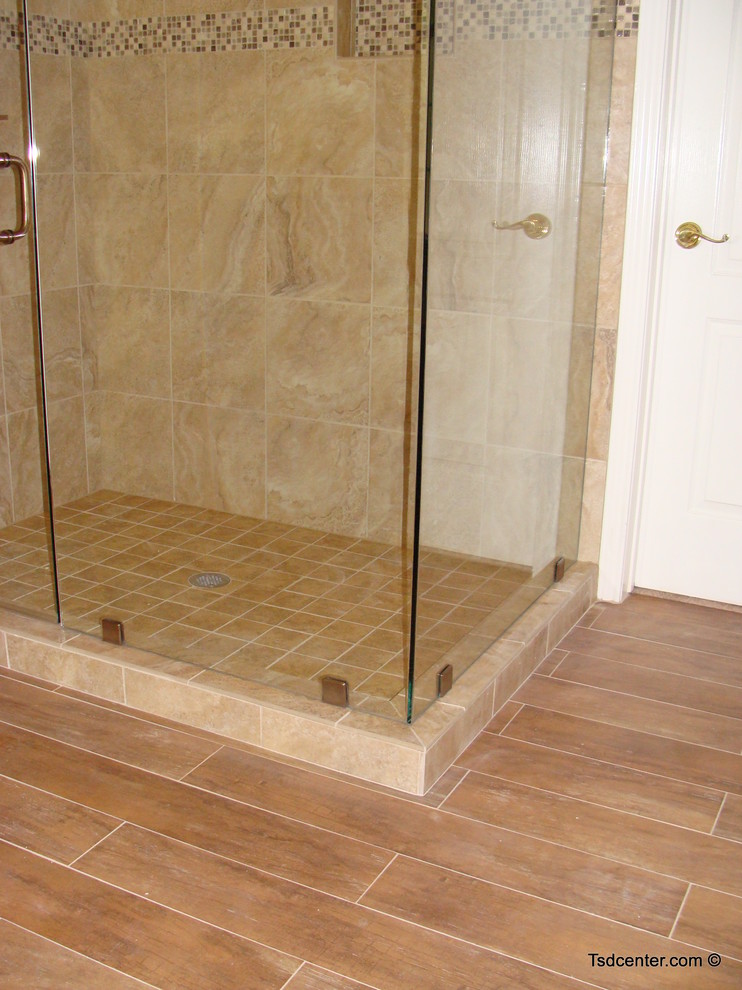 Inspiration for a transitional multicolored tile and porcelain tile porcelain tile drop-in bathtub remodel with an undermount sink and white cabinets