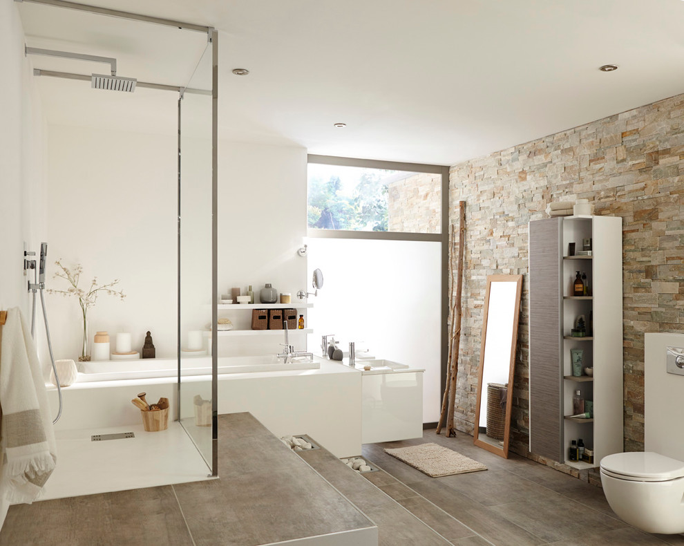 Design ideas for a large contemporary master bathroom in Lille with white cabinets, an undermount tub, gray tile, porcelain tile, white walls, porcelain floors, a console sink, an open shower and an open shower.