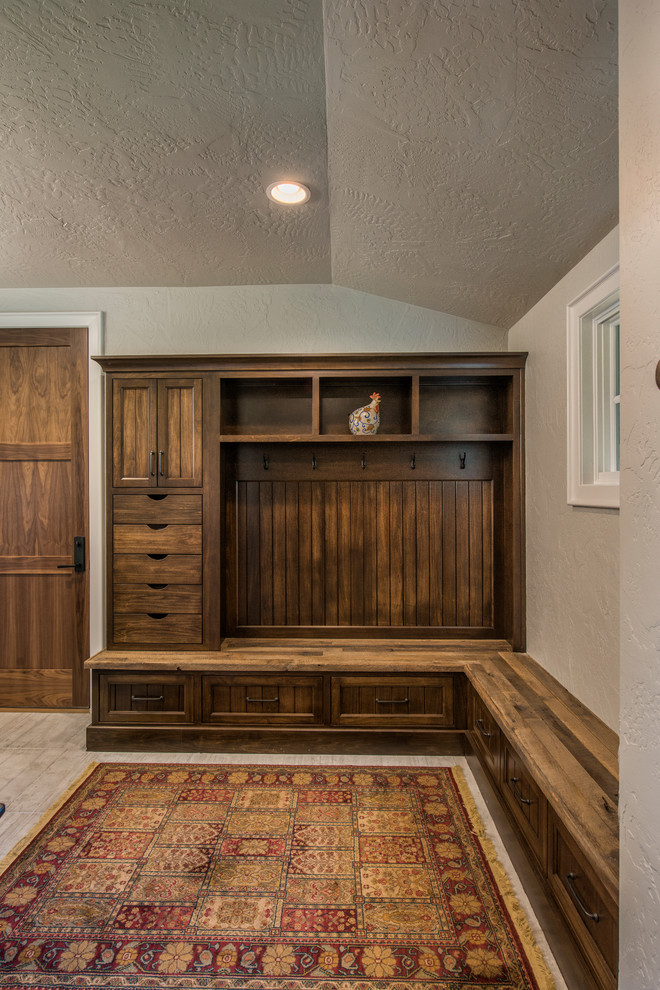 Inspiration for a large country mudroom in Other.