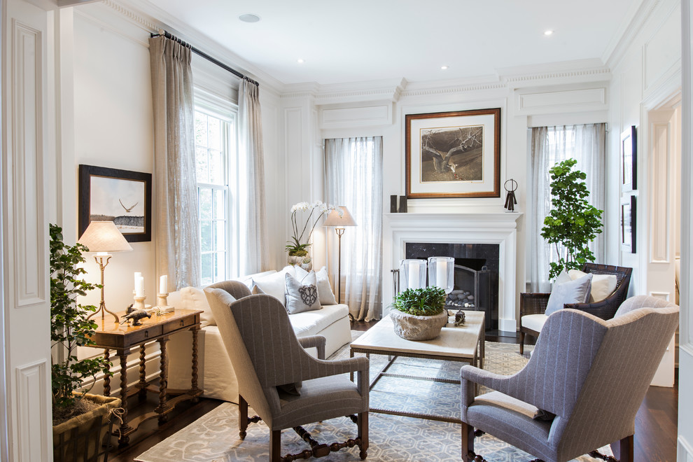 Design ideas for a traditional formal enclosed living room in Toronto with white walls and dark hardwood floors.