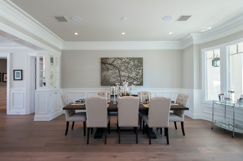 Inspiration for a large traditional kitchen/dining combo in Los Angeles with grey walls and medium hardwood floors.