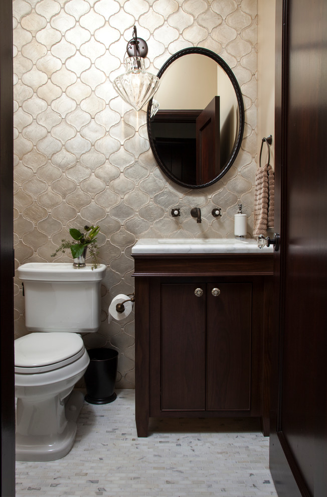 Example of a small tuscan 3/4 ceramic tile and gray tile marble floor bathroom design in San Francisco with an undermount sink, shaker cabinets, dark wood cabinets, marble countertops, beige walls and a two-piece toilet