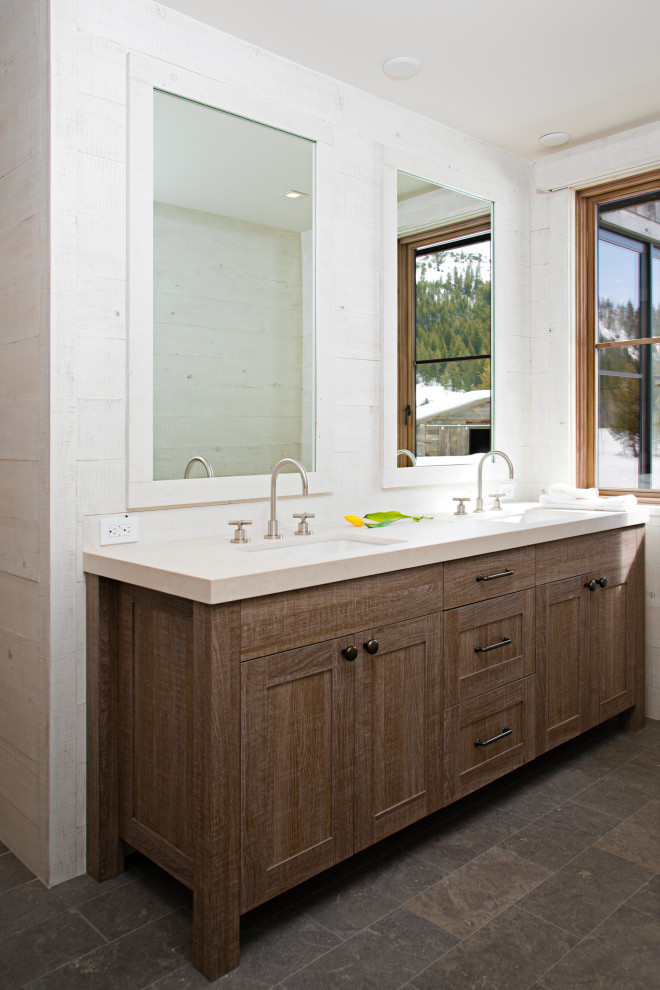 Inspiration for a rustic bathroom remodel with shaker cabinets, an undermount sink and a built-in vanity