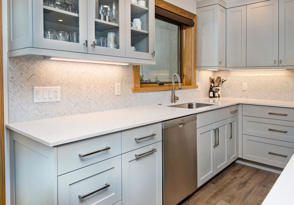Example of a transitional kitchen design in Denver