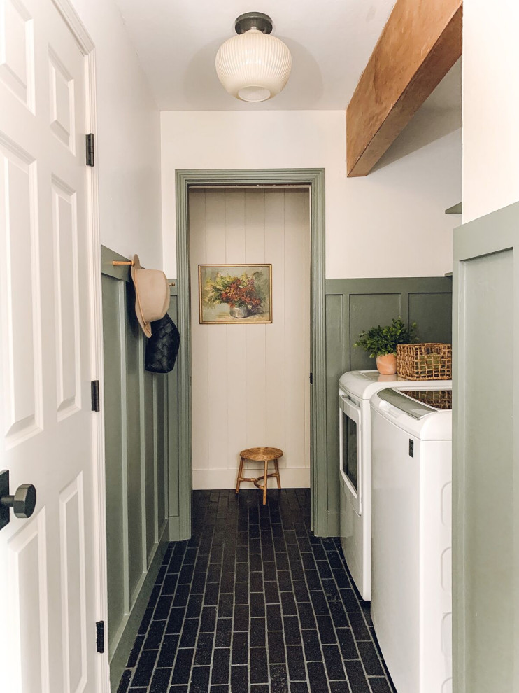 This is an example of a small contemporary laundry room in San Francisco with brick floors.