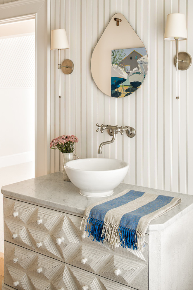 Inspiration for a beach style bathroom in Portland Maine with white cabinets, white walls and a vessel sink.