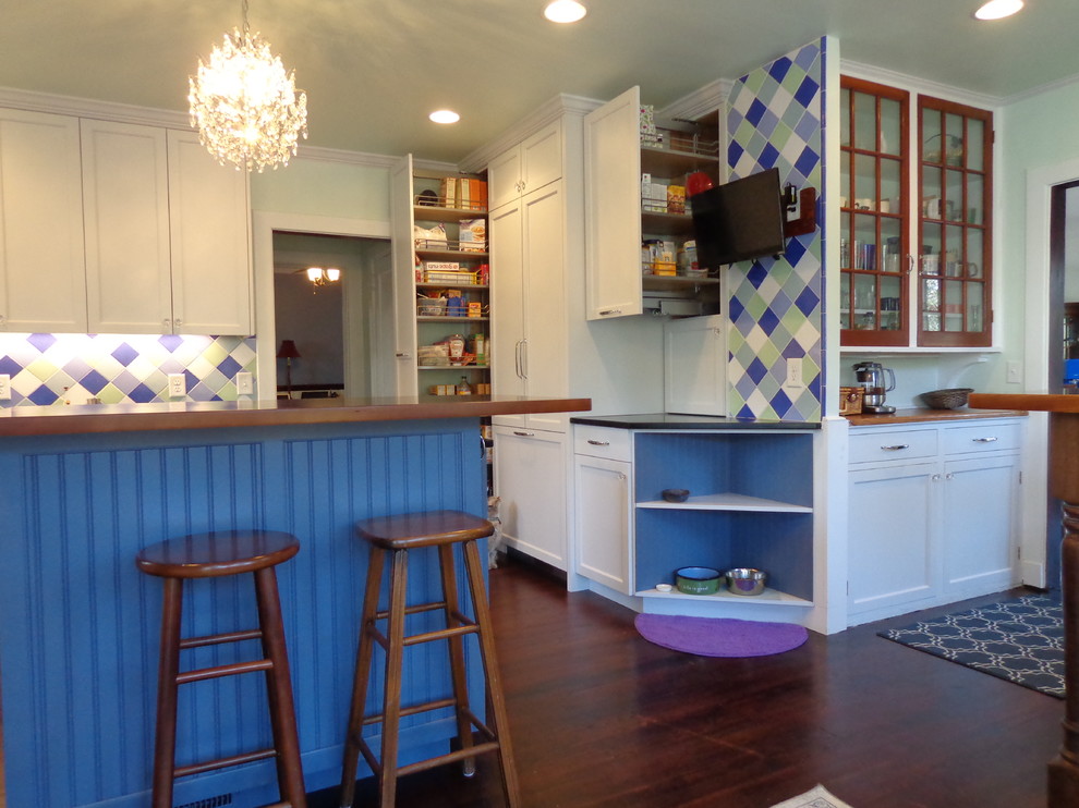 Example of a transitional kitchen design in Raleigh